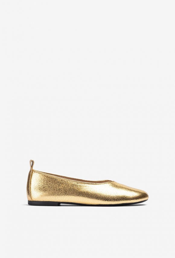 Unisa Mujer Bailarina con detalle de costura - Oro